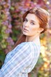 Colourful portrait of a beautiful young redhaired woman