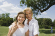Foto: Mother with daughter in a park Mother with daughter in a park