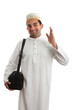Friendly ethnic man waving
