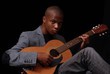Teen playing guitar