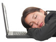 Powernap woman sleeping on laptop