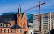 Church and modern building in the European Quarter in Brussels