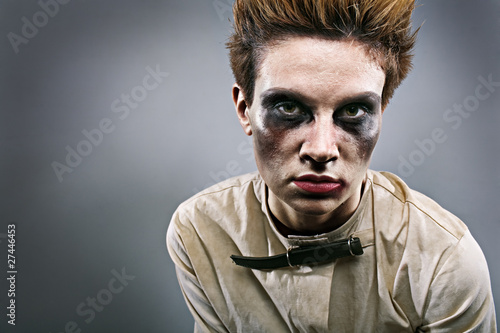Photo: scary zombie girl in gray room scary zombie girl in gray room