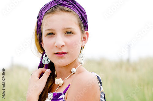 Photo: Closeup of model girl on the beach Closeup of model girl on the beach