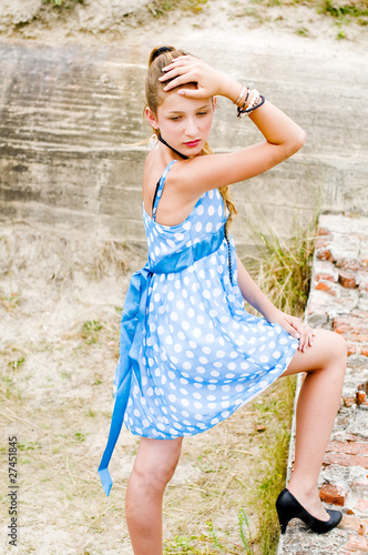 Photo: Fashion girl urbex location blue polka dress Fashion girl urbex location blue polka dress