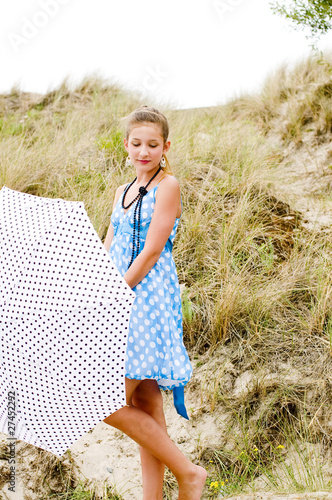 Photo: Fashion girl urbex location blue polka dress Fashion girl urbex location blue polka dress