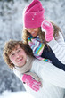 Couple playing snowballs