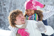 Couple playing snowballs