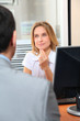 Man meeting financial adviser in office Man meeting financial adviser in office