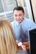 Woman meeting financial adviser in office Woman meeting financial adviser in office