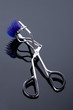 Photo: Artificial eyelashes and eyelash curler. Artificial eyelashes and eyelash curler.