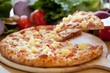 Hawaiian Pizza lifted slice