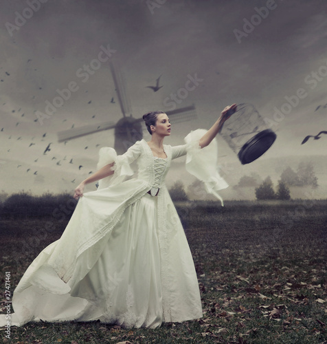 Photo: Glamorous woman with cage Glamorous woman with cage