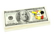 Photo: Tablets and dollars on a white background Tablets and dollars on a white background