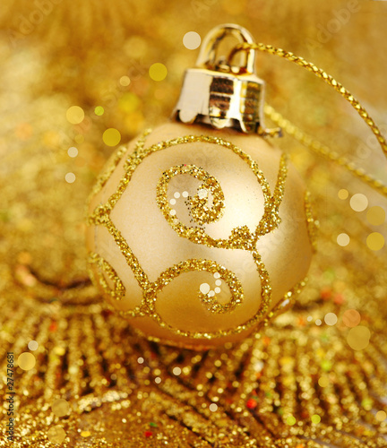 Photo: christmas balls on golden background christmas balls on golden background