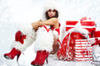 attractive young christmas women with the gift