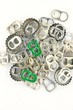 Pulled open aluminum cans and Soda bottle cap