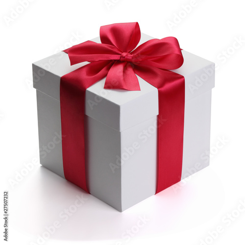 Photo: Gift with ribbon and bow. Gift with ribbon and bow.