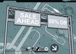 Design template of a large billboard sign featuring “SALE” text. Design template of a large billboard sign featuring “SALE” text.