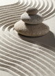 onde zen sur sable et trois galets
