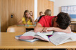 Boy asleep in classroom
