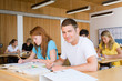 Photo: High school students giving an exam in a classroom High school students giving an exam in a classroom