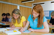 High school students giving an exam in a classroom