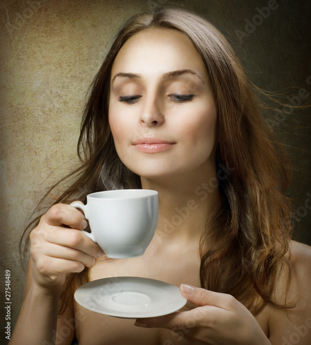 Photo: Beautiful Woman Drinking Coffee Beautiful Woman Drinking Coffee