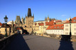 View on the autumn Prague gothic Castle with the Charles Bridge