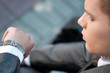 business man waiting at park. Watch. Student