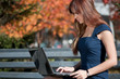 Young businesswoman using notebook