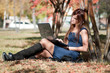 Young businesswoman using notebook