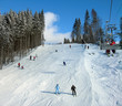Ski track with chair lift in the mountains Ski track with chair lift in the mountains