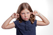 Photo: Girl with Fingers in Ears Girl with Fingers in Ears