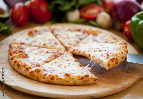 Photo: Cheese pizza slice lift Cheese pizza slice lift
