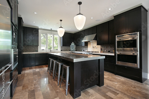 Photo: Kitchen with dark wood cabinetry Kitchen with dark wood cabinetry