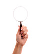 hand holding magnifying glass