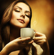 Beautiful Woman with cup of Coffee Beautiful Woman with cup of Coffee