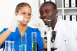 two scientists doing work in lab