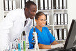 two young african scientists working in lab