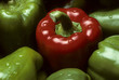 Photo: Single red Bell pepper among green peppers Single red Bell pepper among green peppers