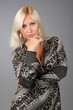 Blonde business woman thinking