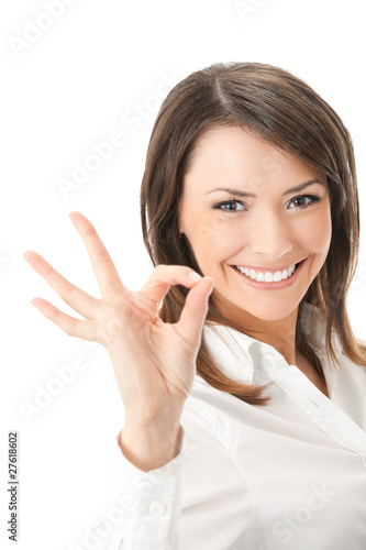 Photo: Portrait of happy smiling businesswoman with okay gesture Portrait of happy smiling businesswoman with okay gesture