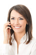 Happy smiling businesswoman with cell phone, isolated