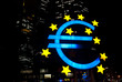 euro symbol mit sternen und hochhaus euro symbol mit sternen und hochhaus