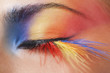 Macro eye of a woman with bright eyeshadow