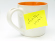Cup with sticky note Cup with sticky note