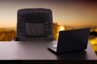 Laptop in a desk inside a modern office