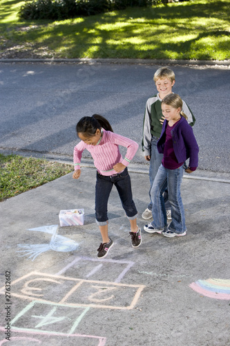 Photo: Kids playing hopscotch Kids playing hopscotch