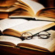 opened book, lying on the bookshelf